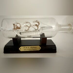 H.M.S. Victory Ship in a Bottle with Brown Base